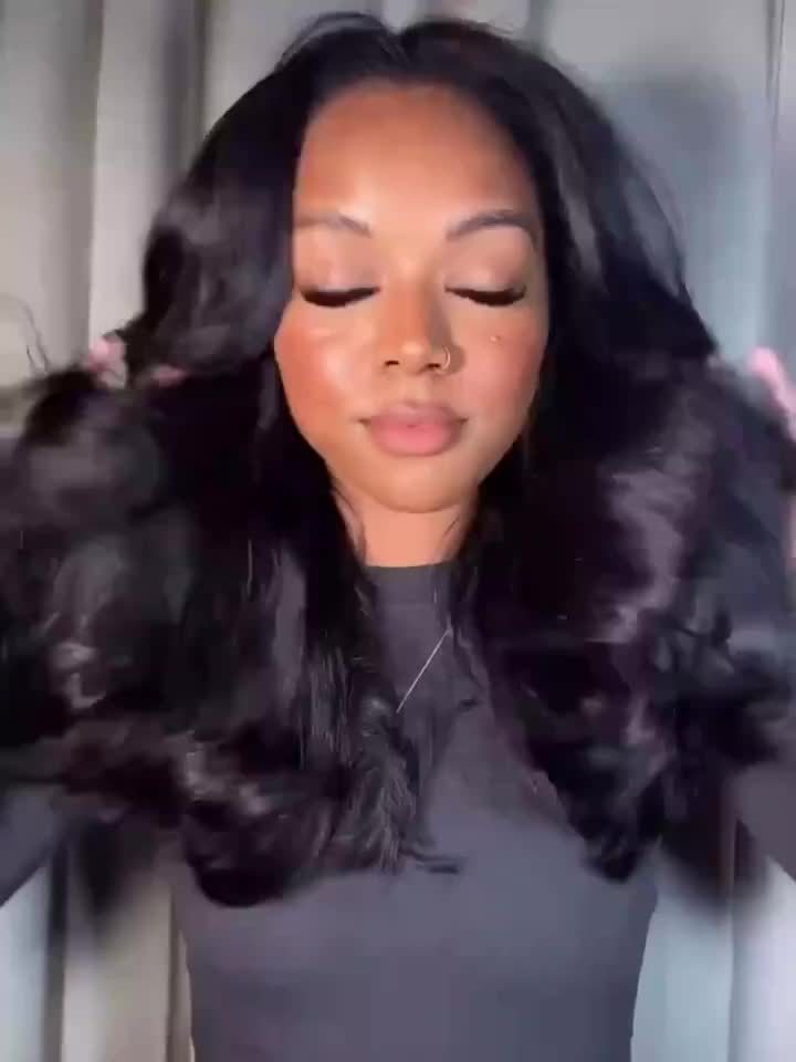 A Glueless Lace Front Wig Made from Brazilian Human Hair for Women, Featuring a Pre-Plucked Hairline And a Natural Brown Body Wave Texture with 180% Density. This Hairpiece Requires No Glue Or Adhesive